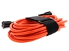 black cinch strap around orange cable