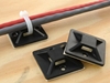 securing cables with black square tie mounts