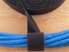 black 1 inch hook and loop around cables